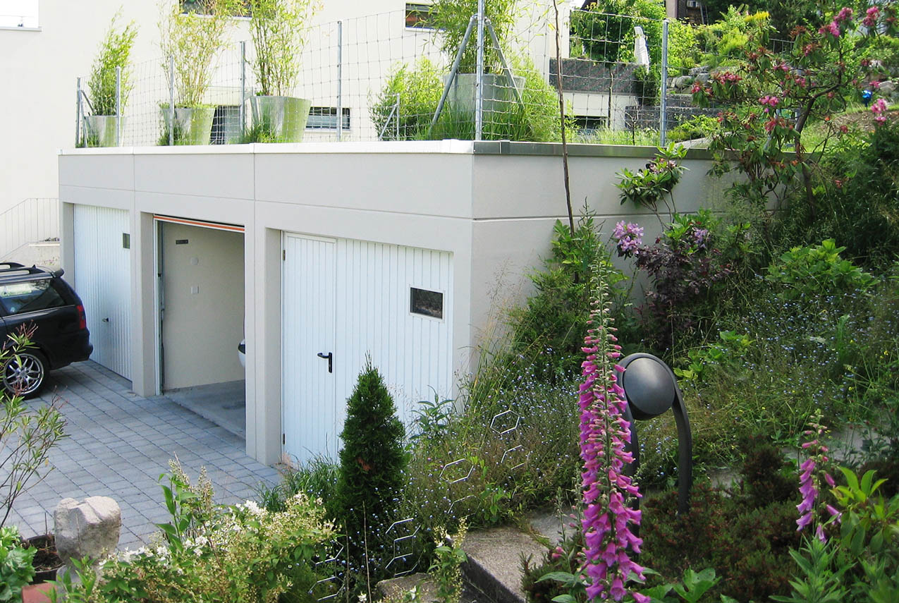 3 garages enterrés avec parapet 50 cm de haut, sans avant-toit